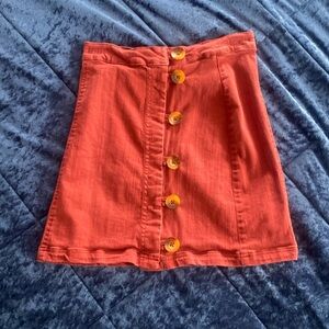 Beautiful rust colored button up skirt